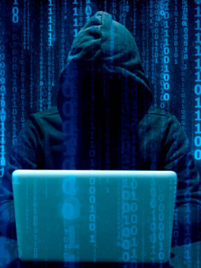 Faceless hooded anonymous computer hacker