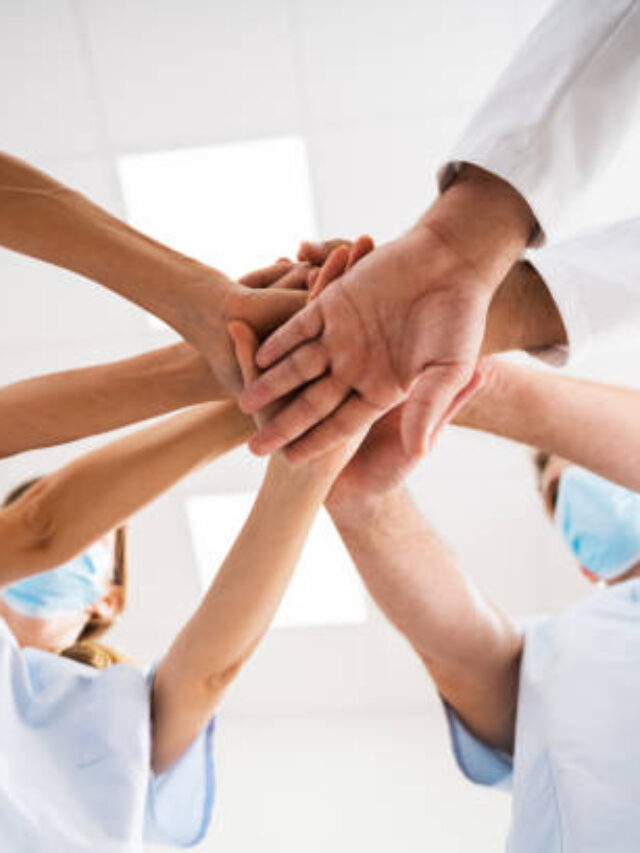 Nurse And Doctor Team Meeting Collaboration. Healthcare Medical Teamwork